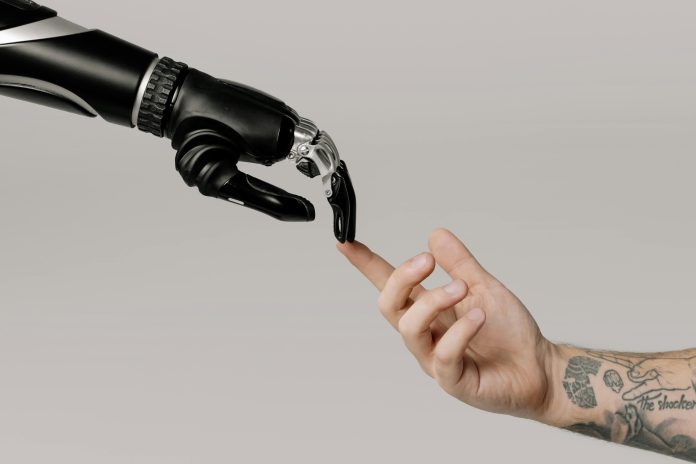 Bionic hand and human hand finger pointing