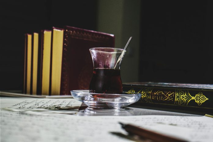 Glass cup with saucer